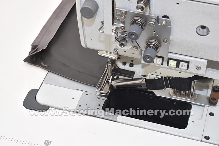 Binding and edge trimming sewing machine