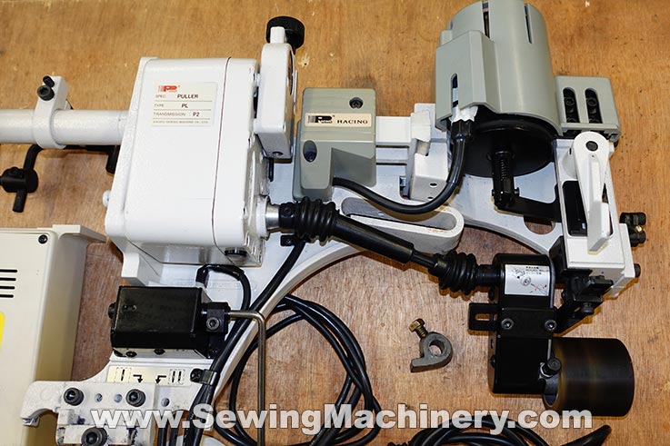 Racing puller feed attachment PL