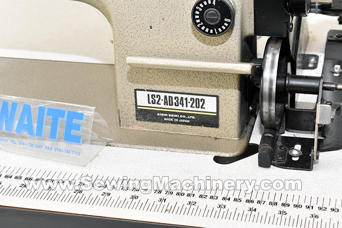 Toyota needle feed sewing machine with trimmer